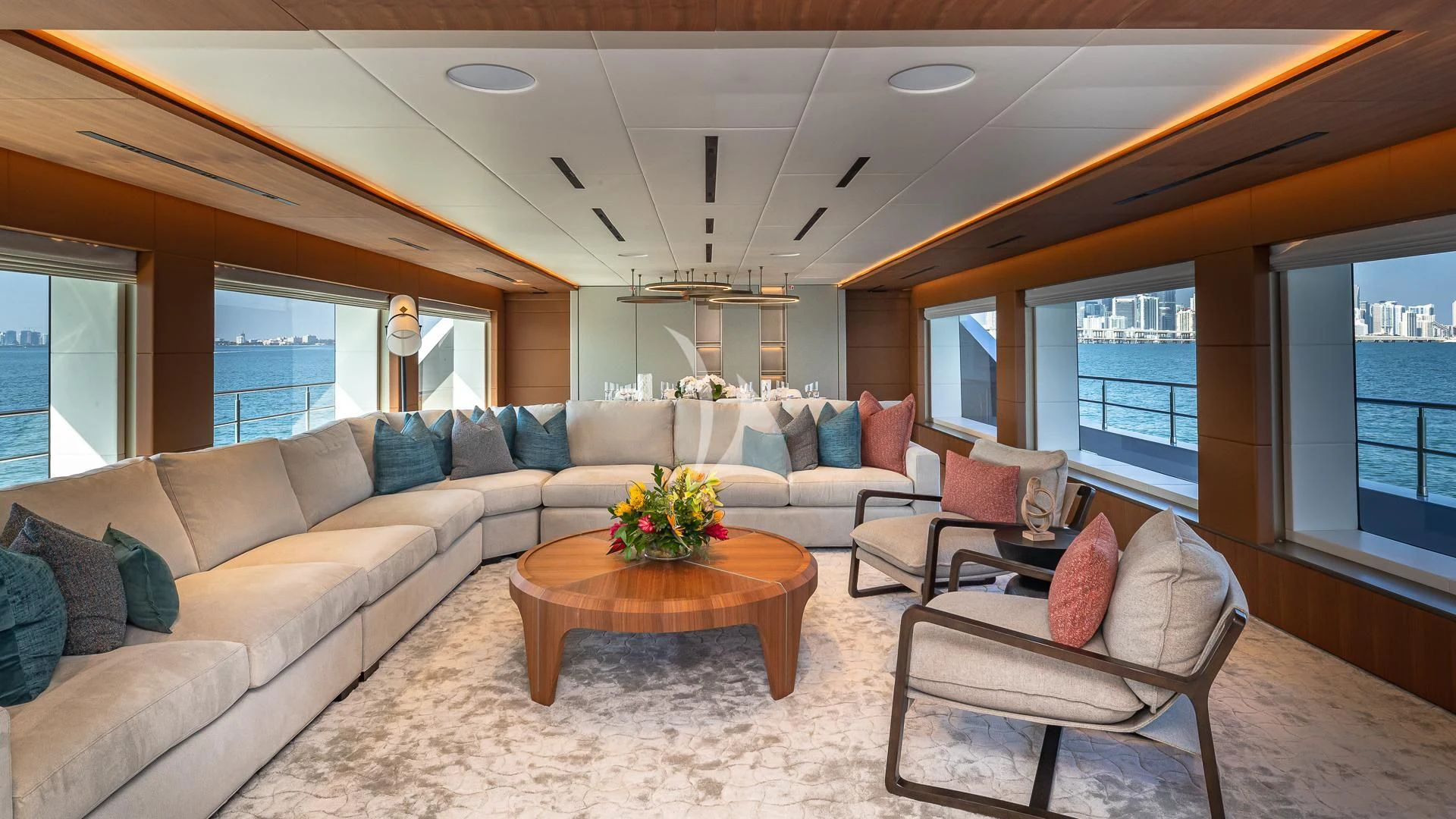 a living room with a large window aboard RISING DAWN Yacht for Sale