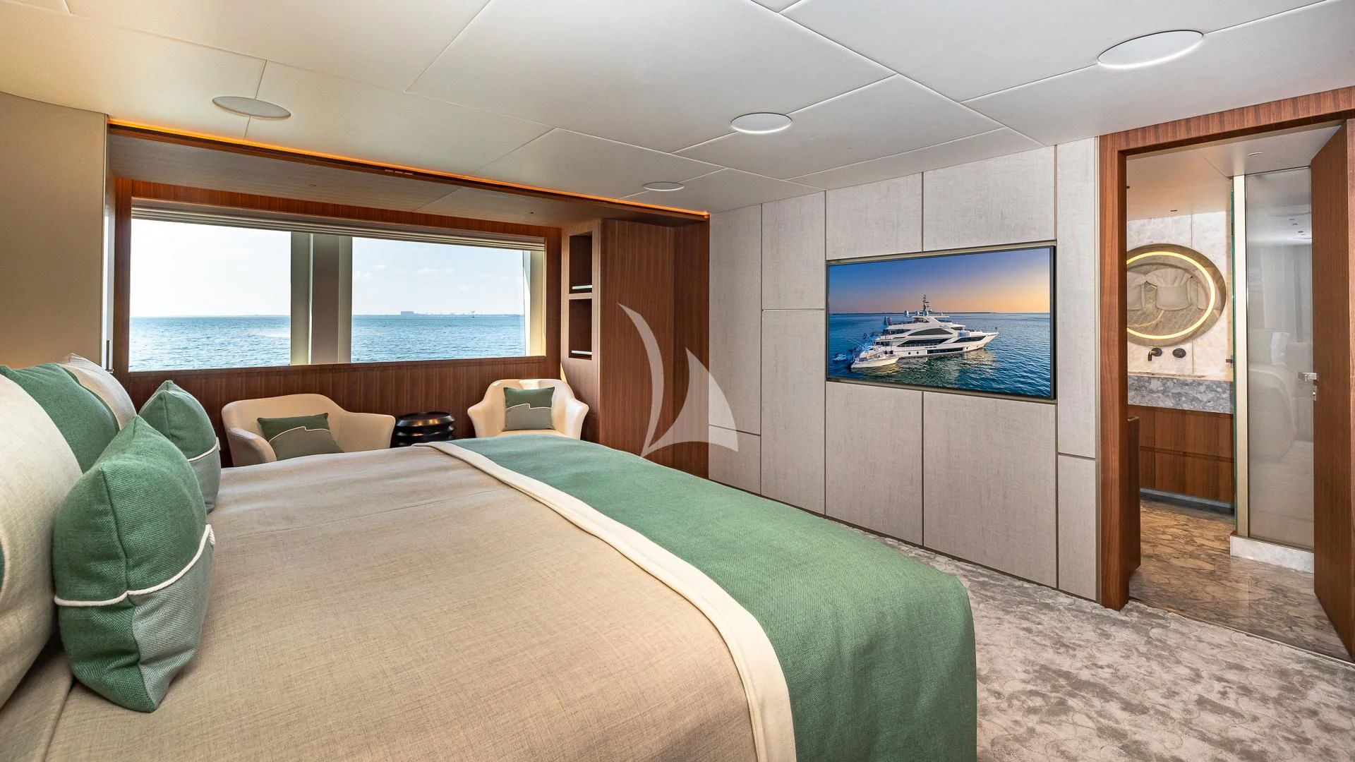a hotel room with a bed and a large window aboard RISING DAWN Yacht for Sale