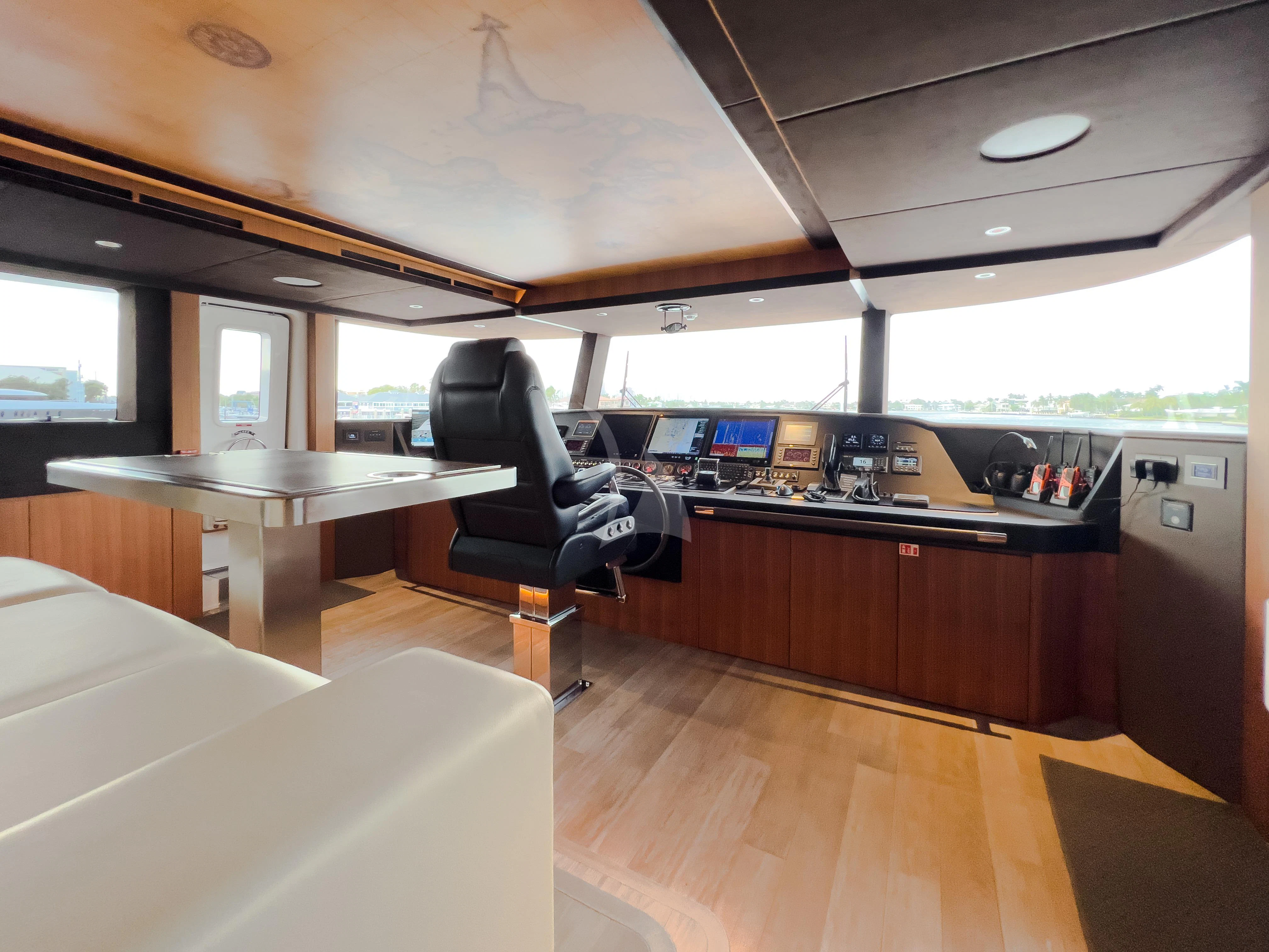 a room with a desk and a chair aboard RISING DAWN Yacht for Sale