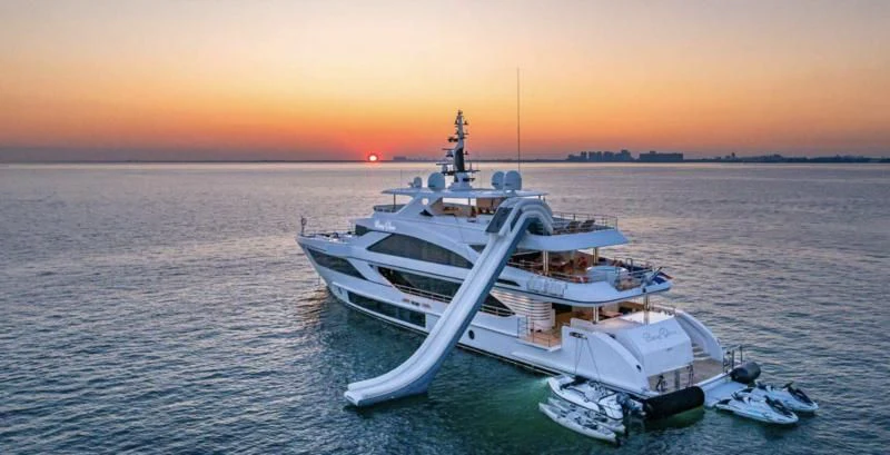 a boat on the water aboard RISING DAWN Yacht for Sale