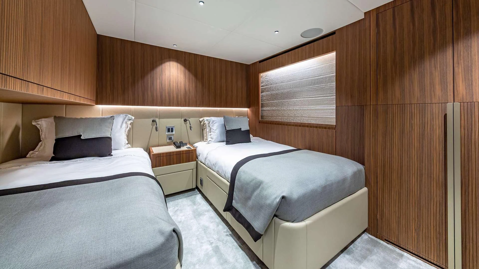 a couple of beds in a room aboard RISING DAWN Yacht for Sale