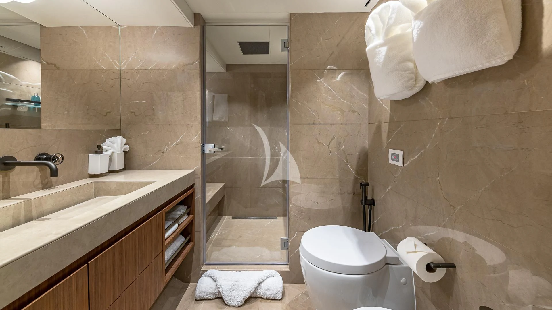 a bathroom with a glass shower aboard RISING DAWN Yacht for Sale