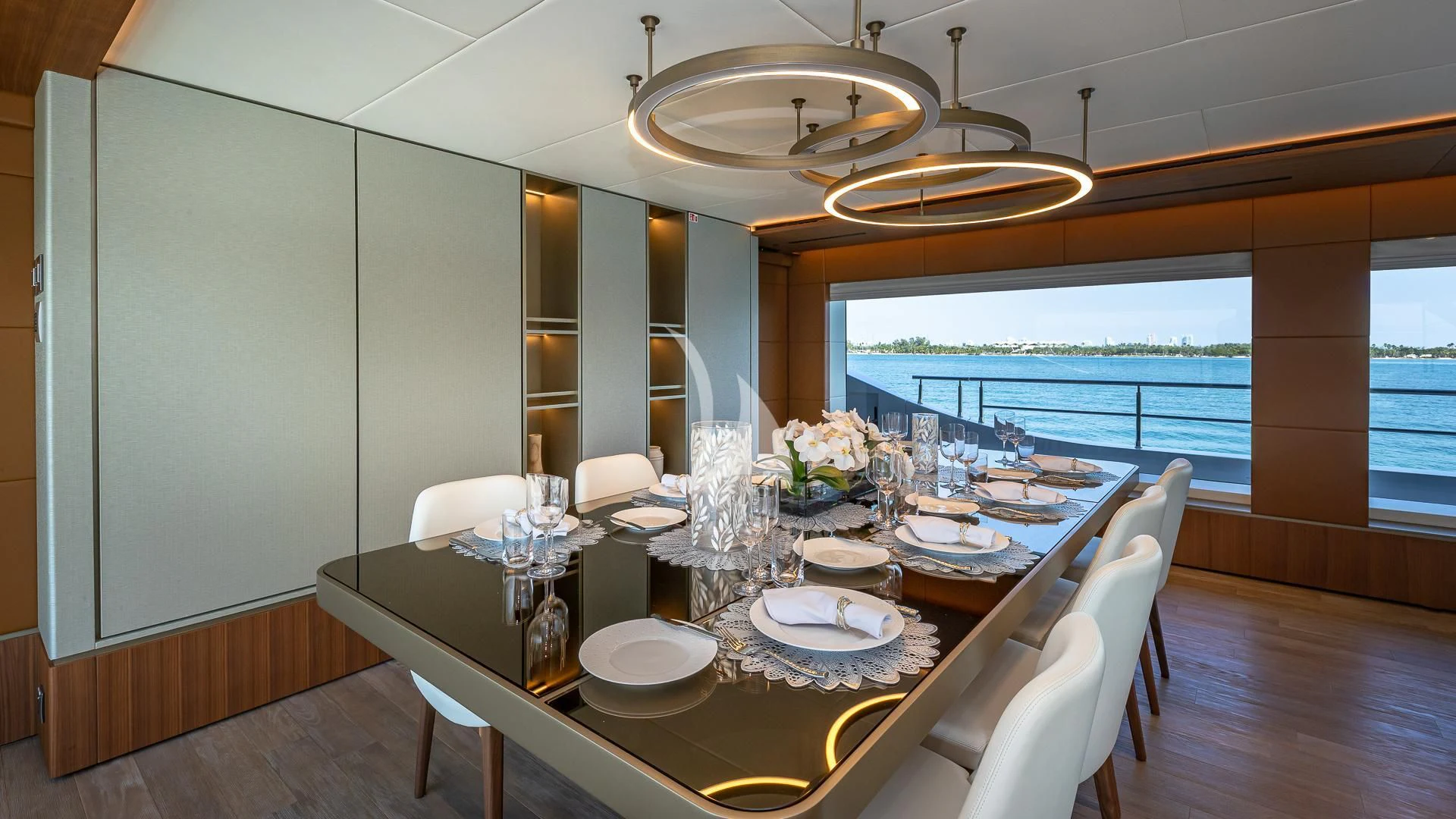 a dining table in a room aboard RISING DAWN Yacht for Sale
