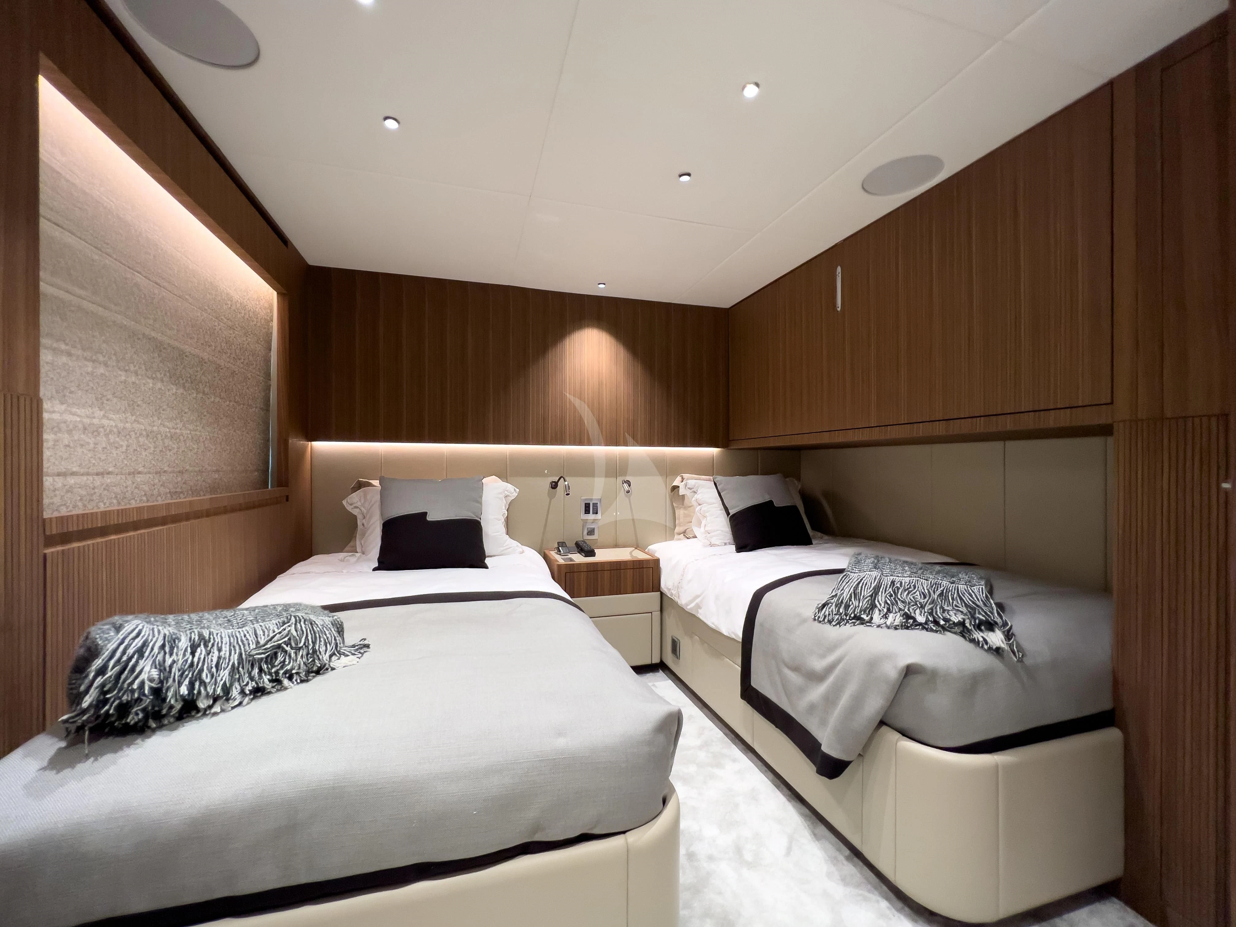 a room with two beds aboard RISING DAWN Yacht for Sale