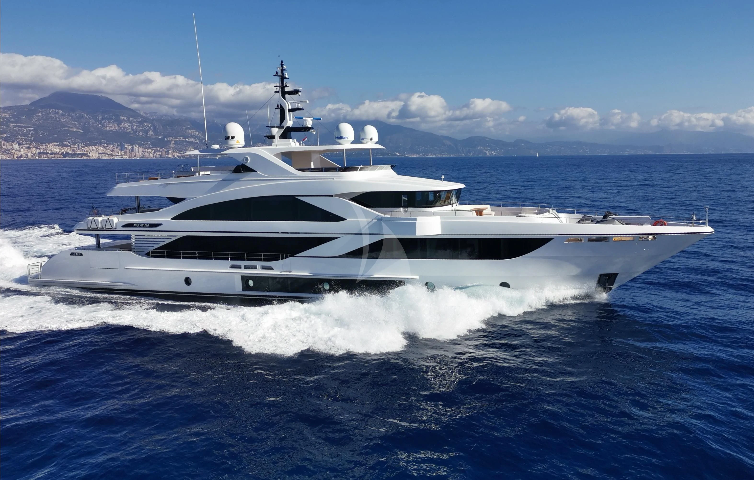 a white yacht on the water aboard RISING DAWN Yacht for Sale