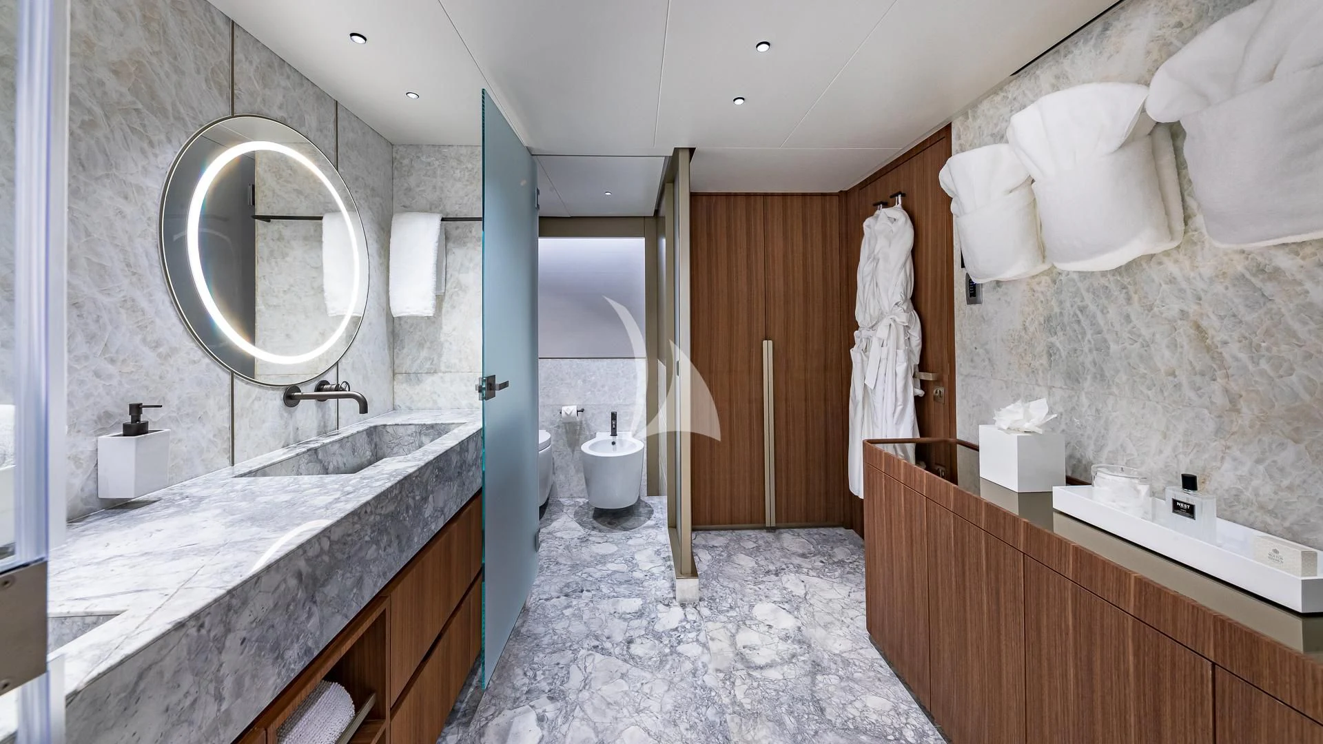 a bathroom with a marble countertop aboard RISING DAWN Yacht for Sale