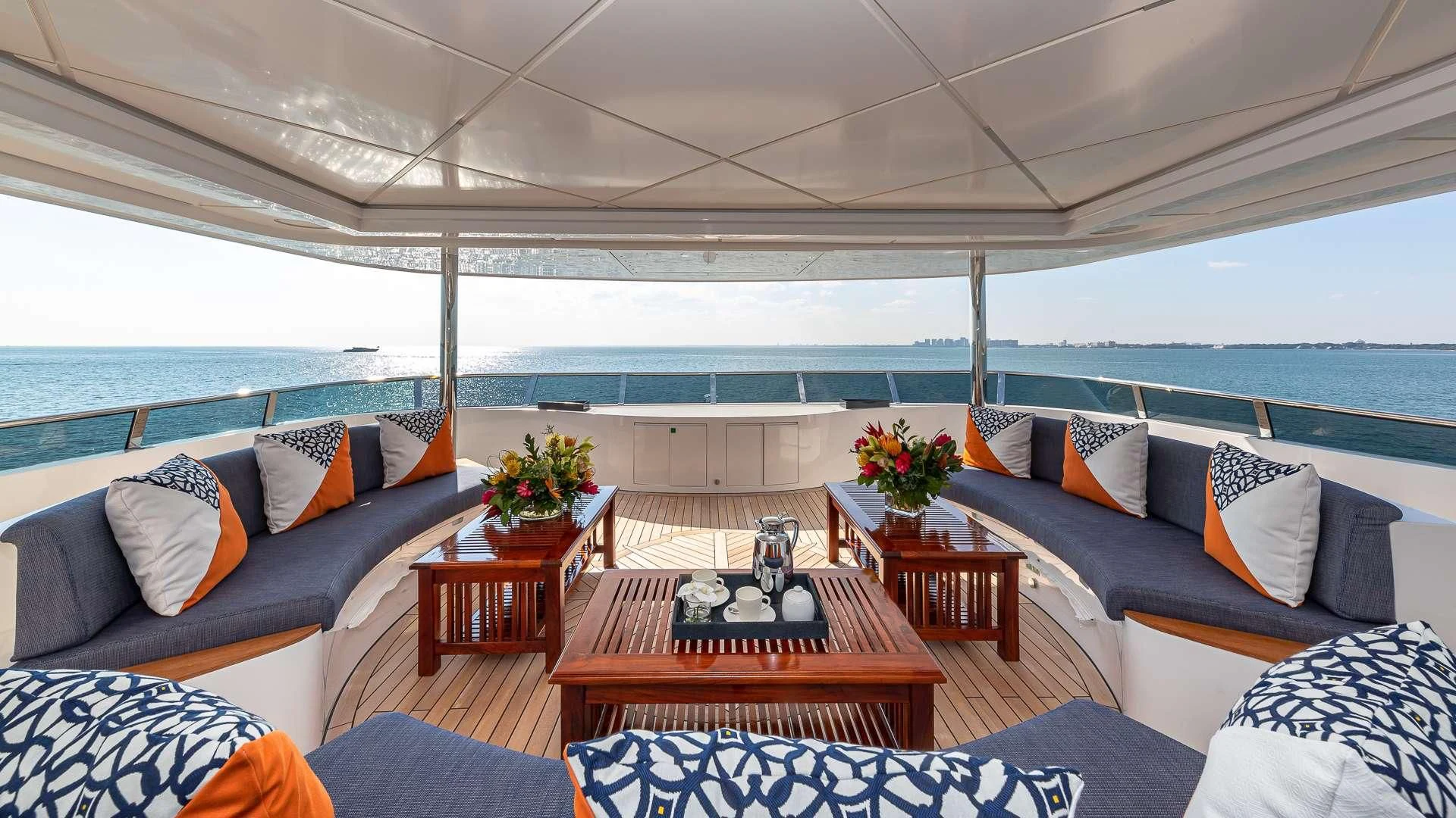 a living room with a large patio aboard RISING DAWN Yacht for Sale
