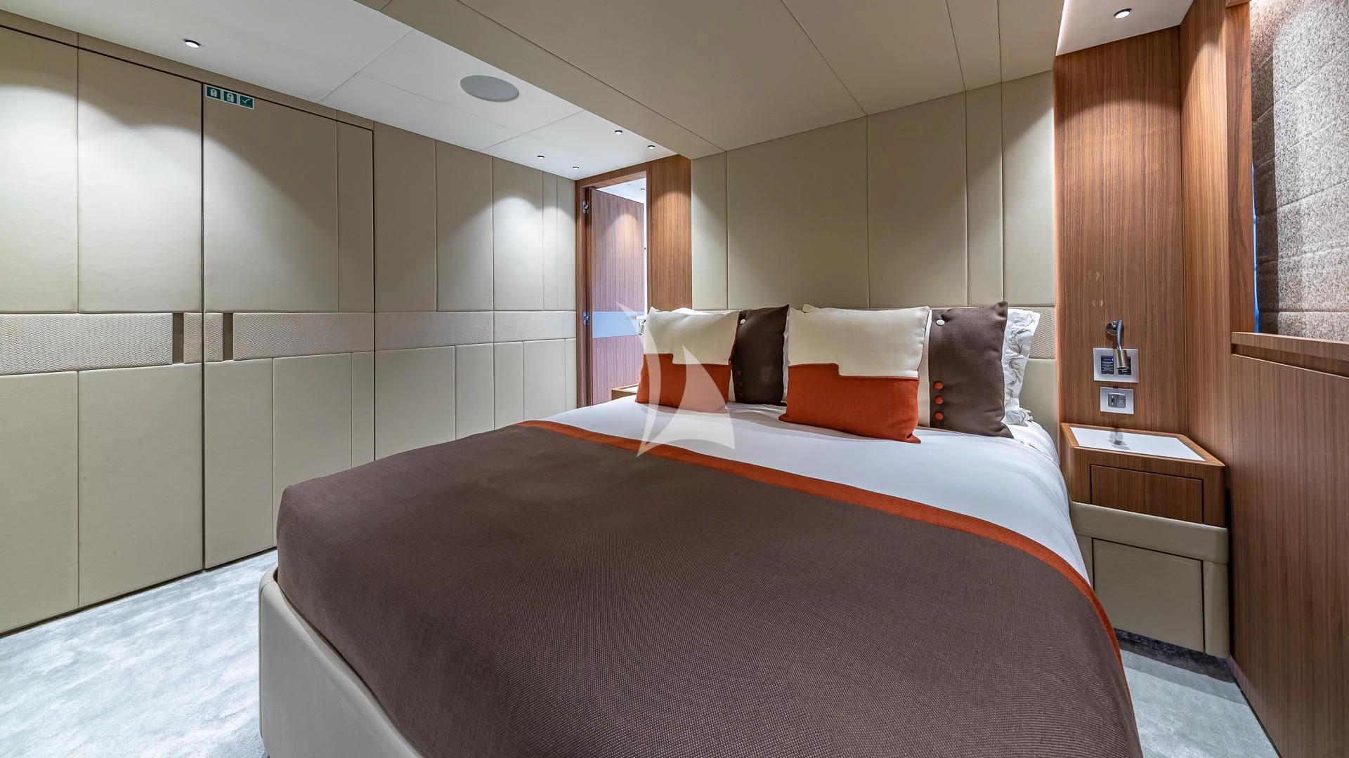 a bed in a room aboard RISING DAWN Yacht for Sale