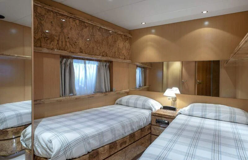 a couple of beds in a hotel room aboard VISOTTA Yacht for Sale