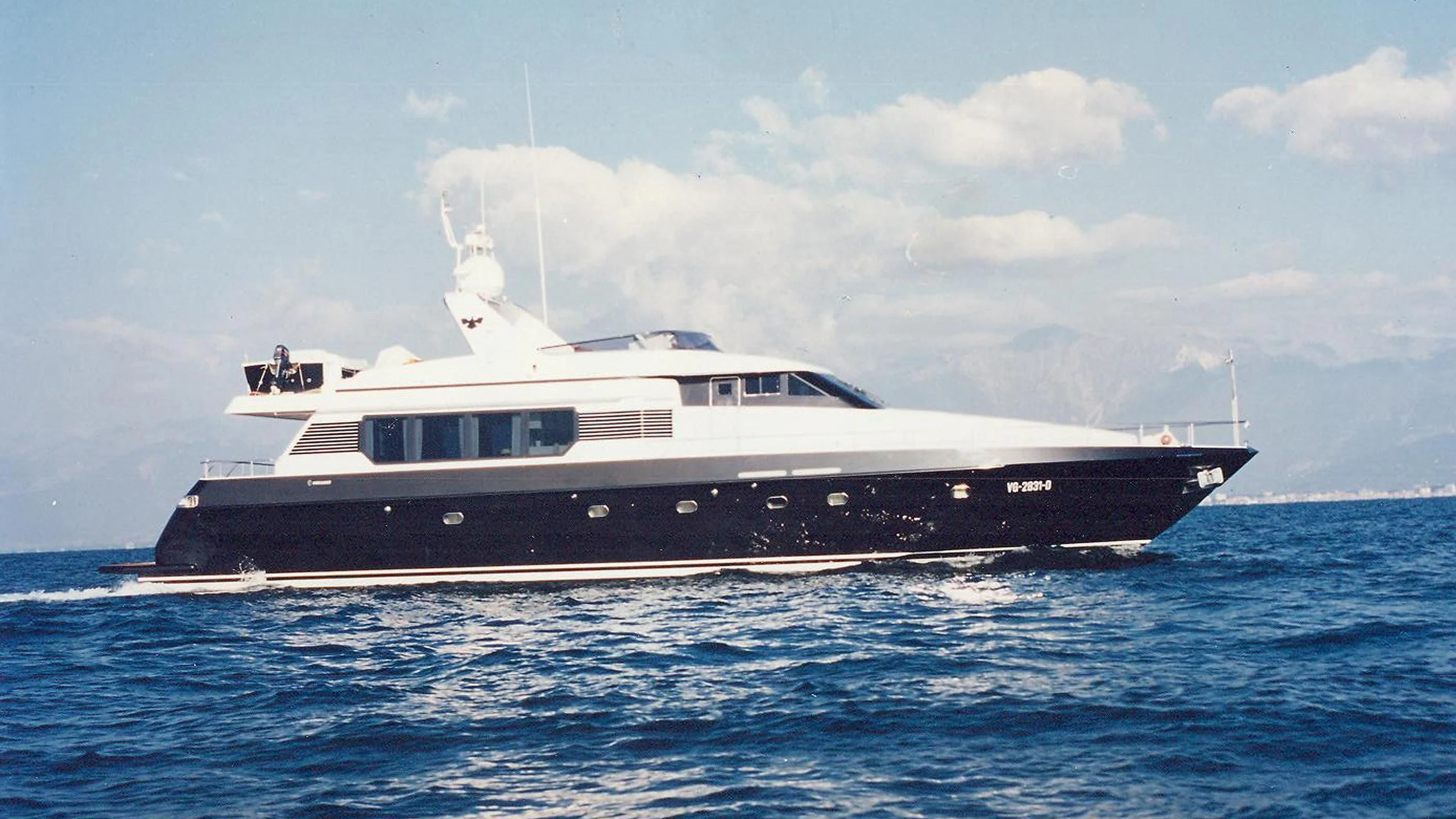 a large boat in the water aboard VISOTTA Yacht for Sale