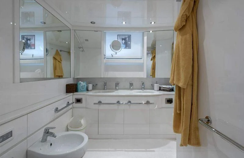 a bathroom with a sink and a mirror aboard VISOTTA Yacht for Sale