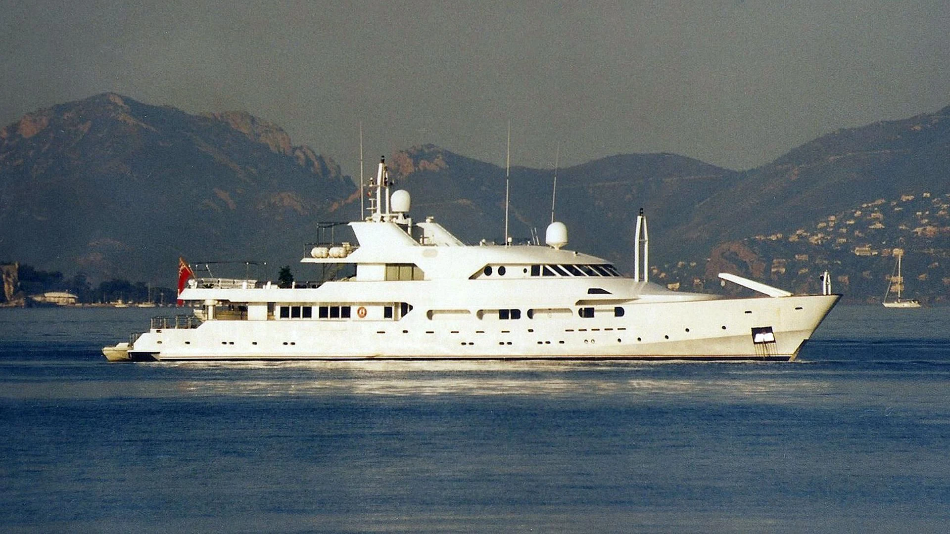 a large white ship in the water aboard ACHILLES Yacht for Sale