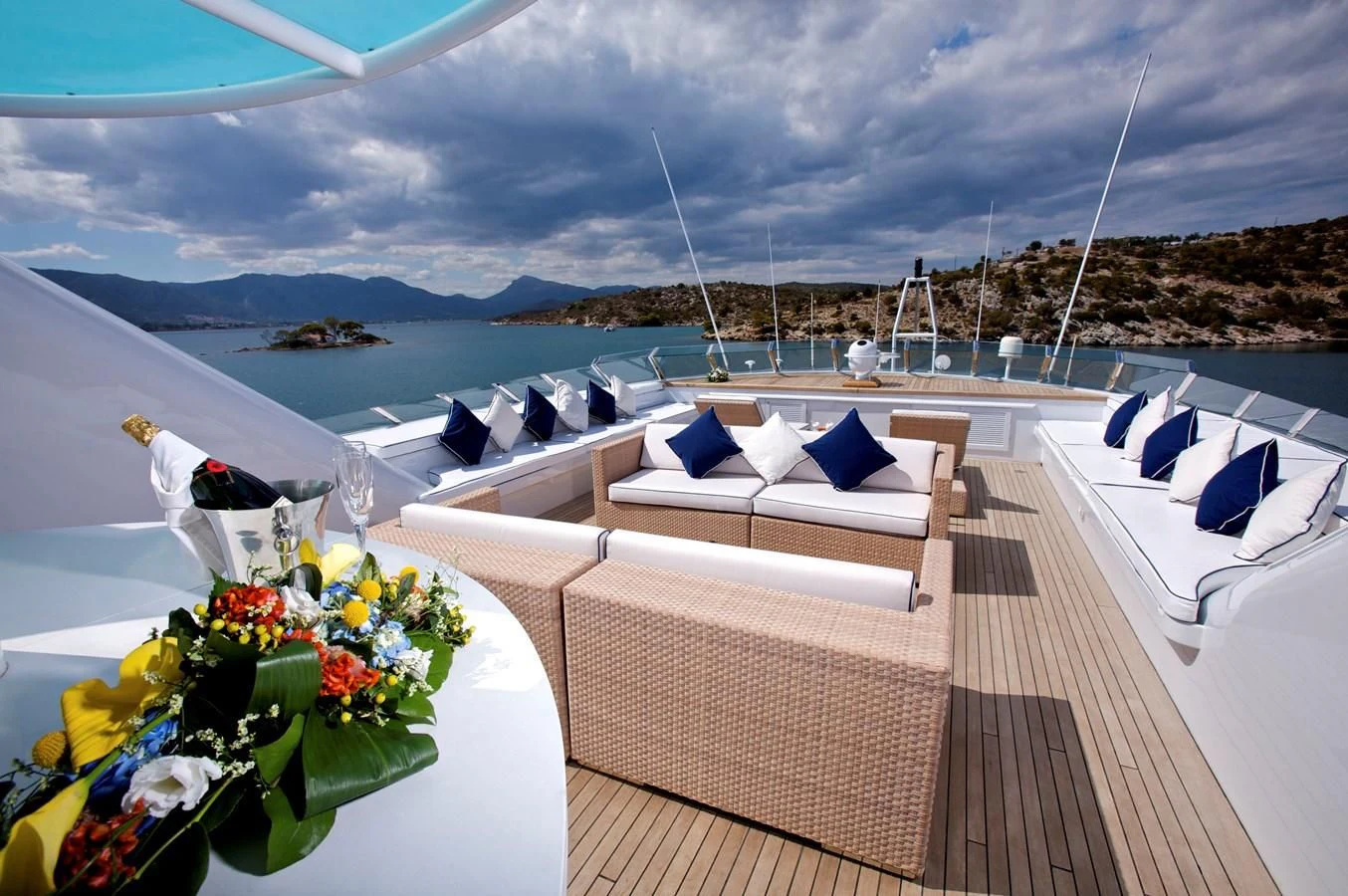 a deck with a view of the ocean and a city aboard ACHILLES Yacht for Sale