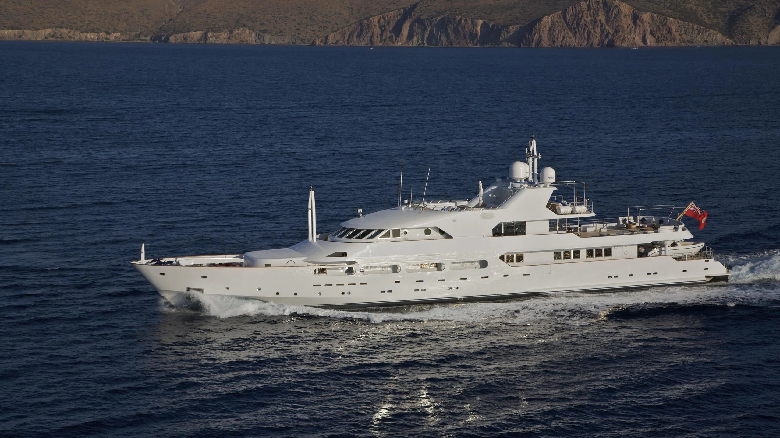 a large white boat in the water aboard ACHILLES Yacht for Sale