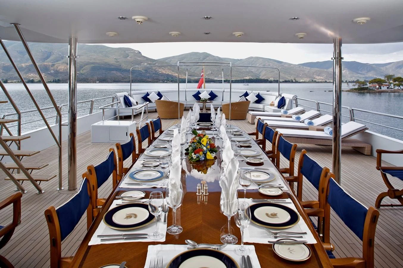 a table set for a dinner party aboard ACHILLES Yacht for Sale