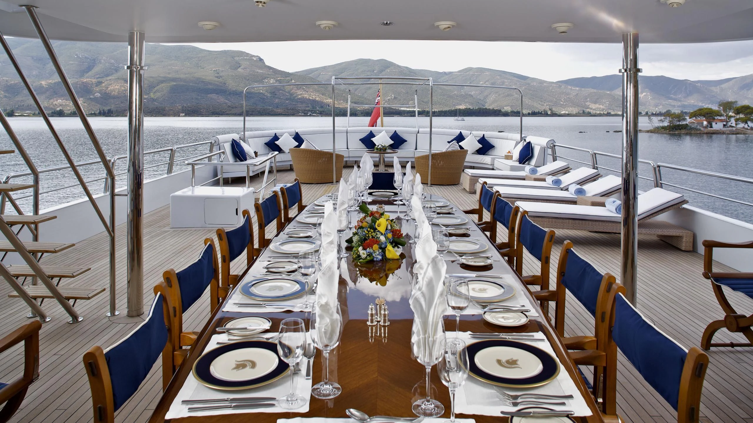 a table set for a dinner party aboard ACHILLES Yacht for Sale