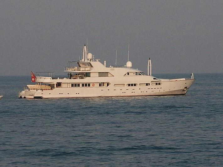 a large ship in the water aboard ACHILLES Yacht for Sale