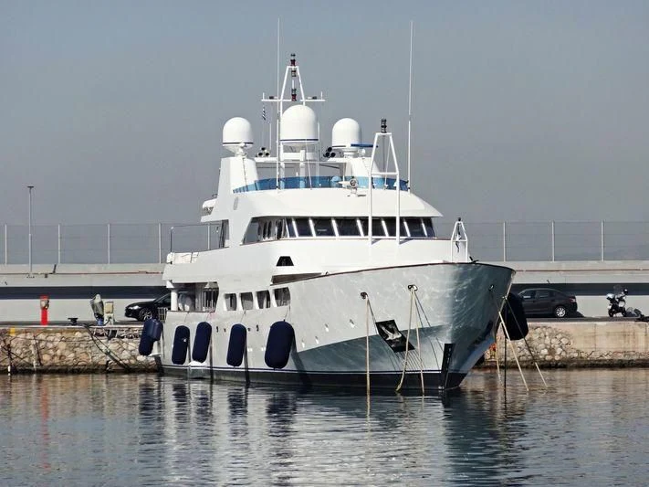 a white boat in the water aboard ACHILLES Yacht for Sale