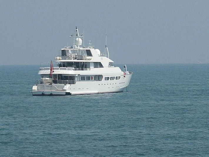 a white boat in the water aboard ACHILLES Yacht for Sale