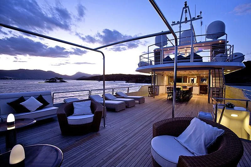 a deck with a boat on it aboard ACHILLES Yacht for Sale
