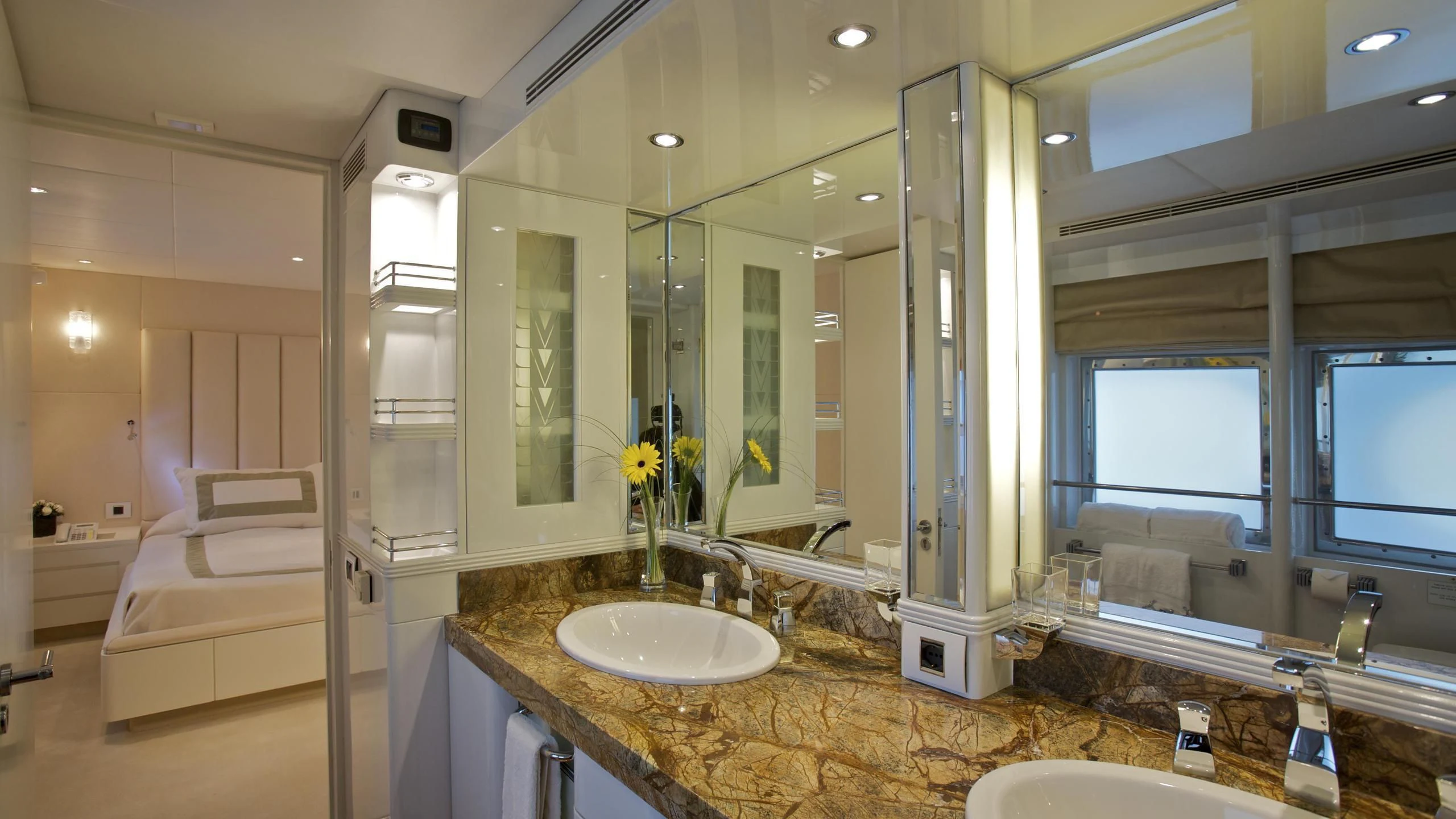 a bathroom with a large mirror aboard ACHILLES Yacht for Sale