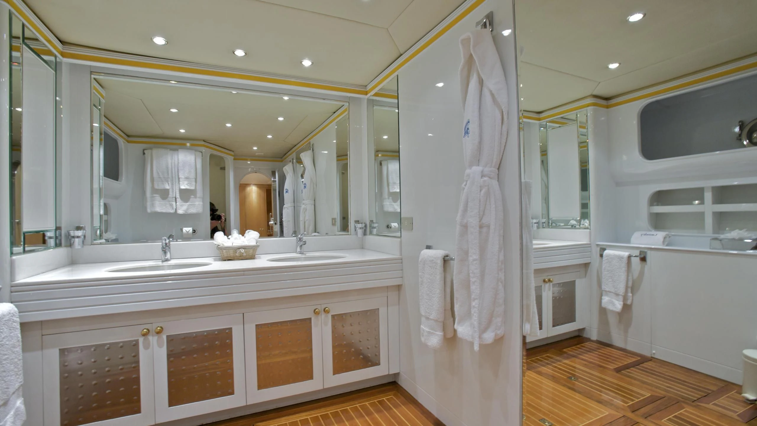 a bathroom with a shower curtain aboard ACHILLES Yacht for Sale