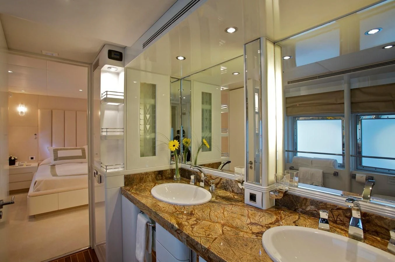 a bathroom with a large mirror aboard ACHILLES Yacht for Sale