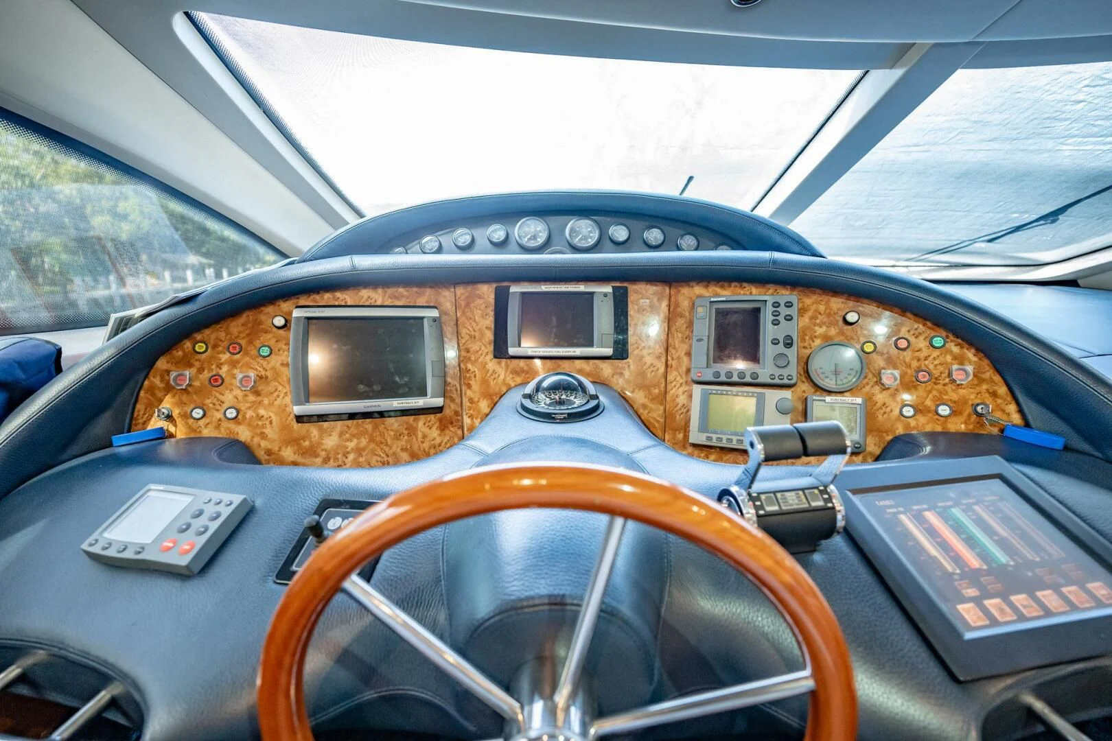 the interior of a car aboard THE CURE Yacht for Sale