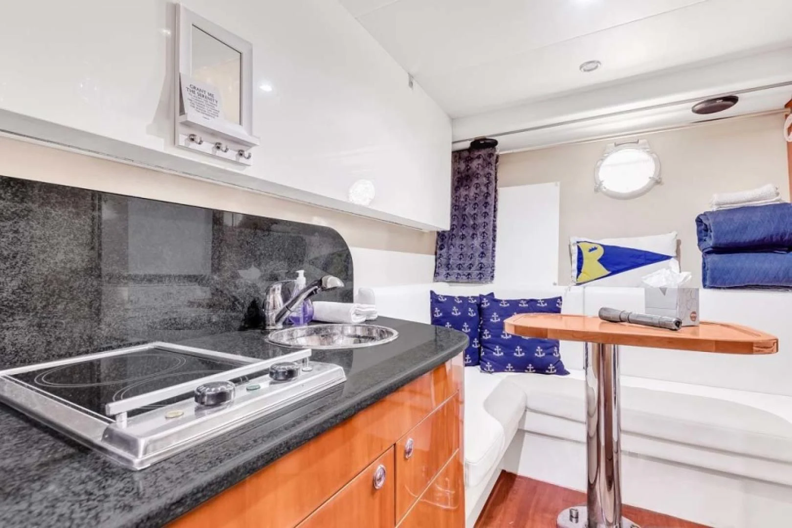 a kitchen with a sink and a countertop aboard THE CURE Yacht for Sale