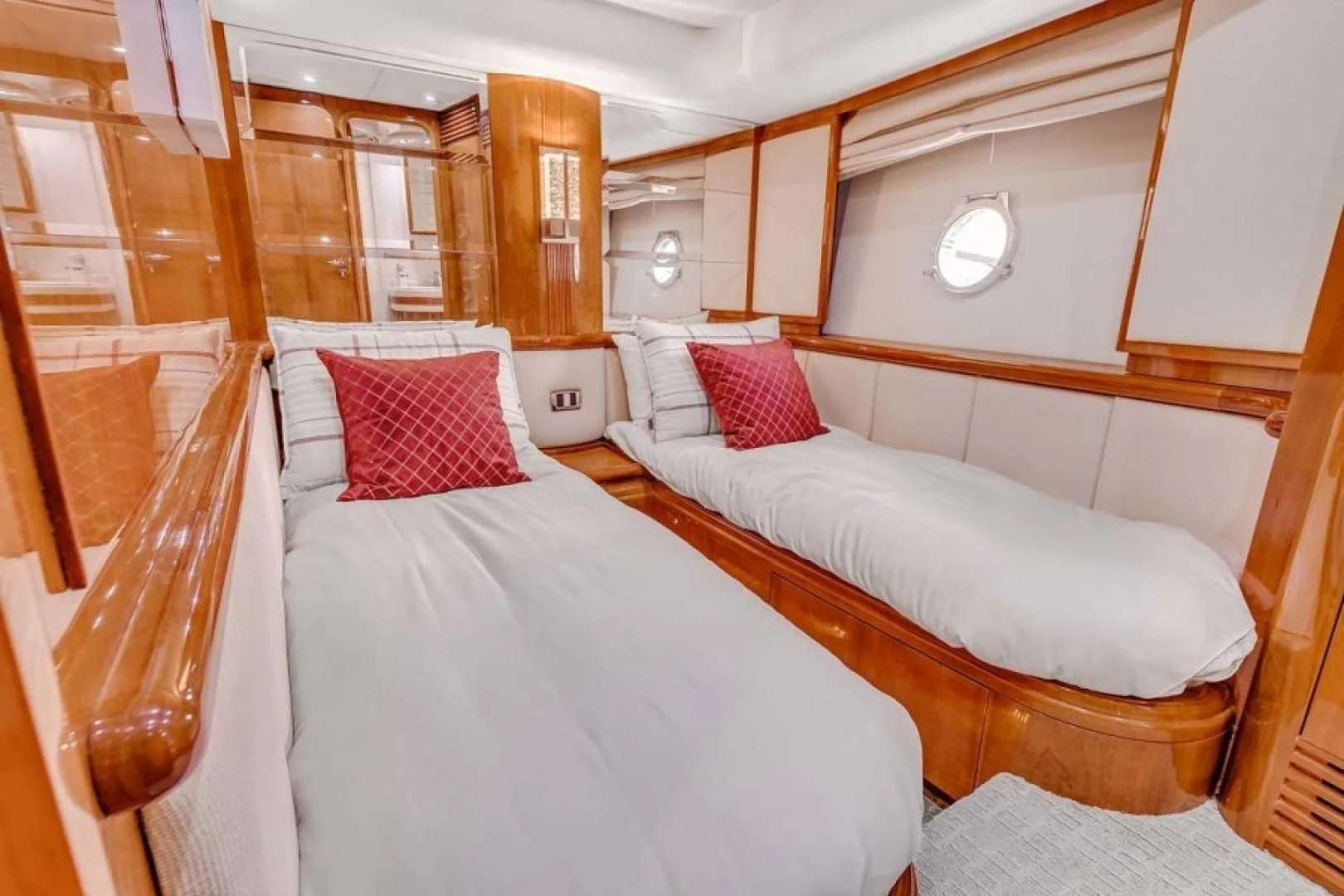 a room with two beds aboard THE CURE Yacht for Sale