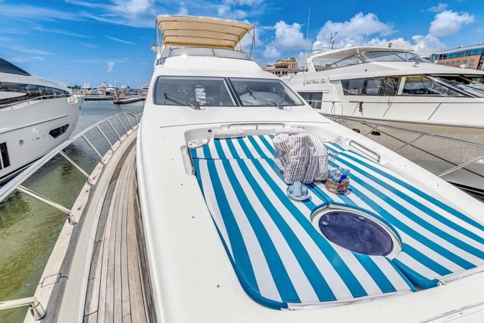 a boat docked at a pier aboard THE CURE Yacht for Sale