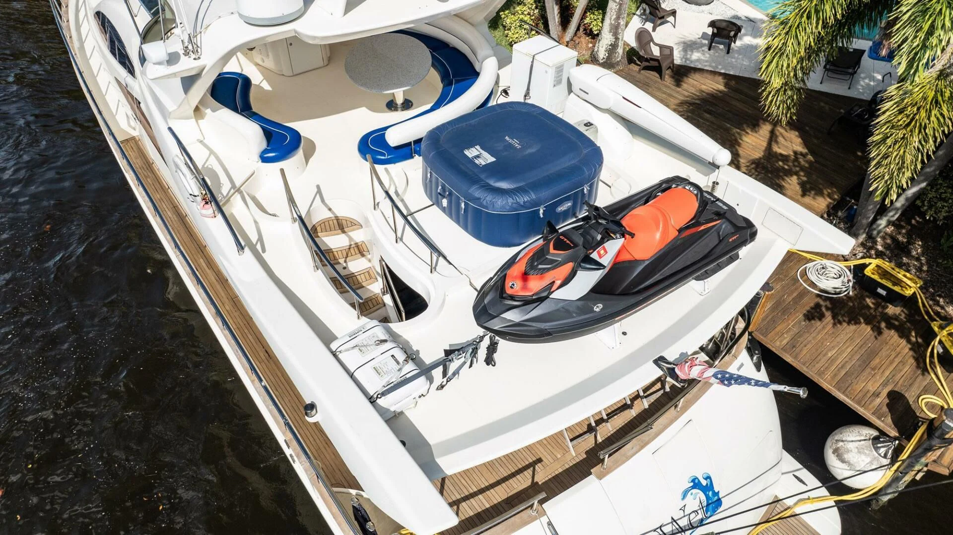 a boat docked at a pier aboard THE CURE Yacht for Sale