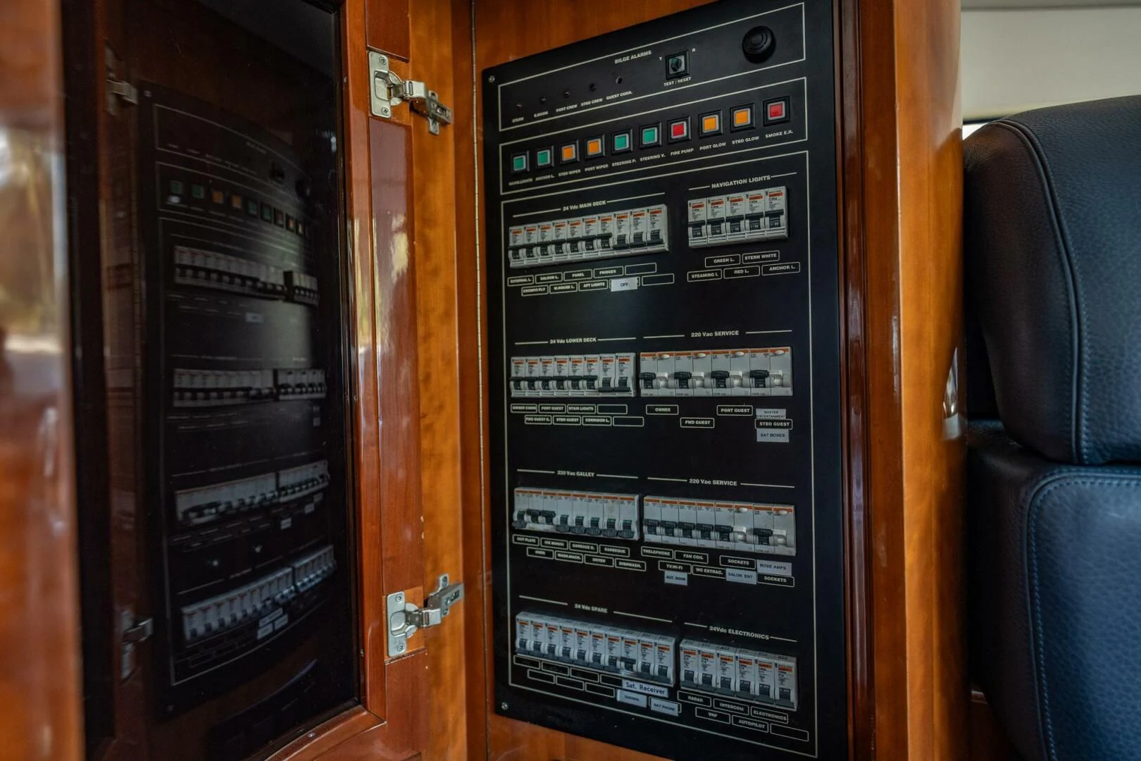 a black rectangular electronic device aboard THE CURE Yacht for Sale