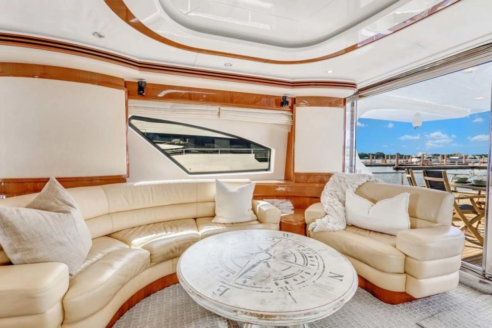 a living room with a large window aboard THE CURE Yacht for Sale