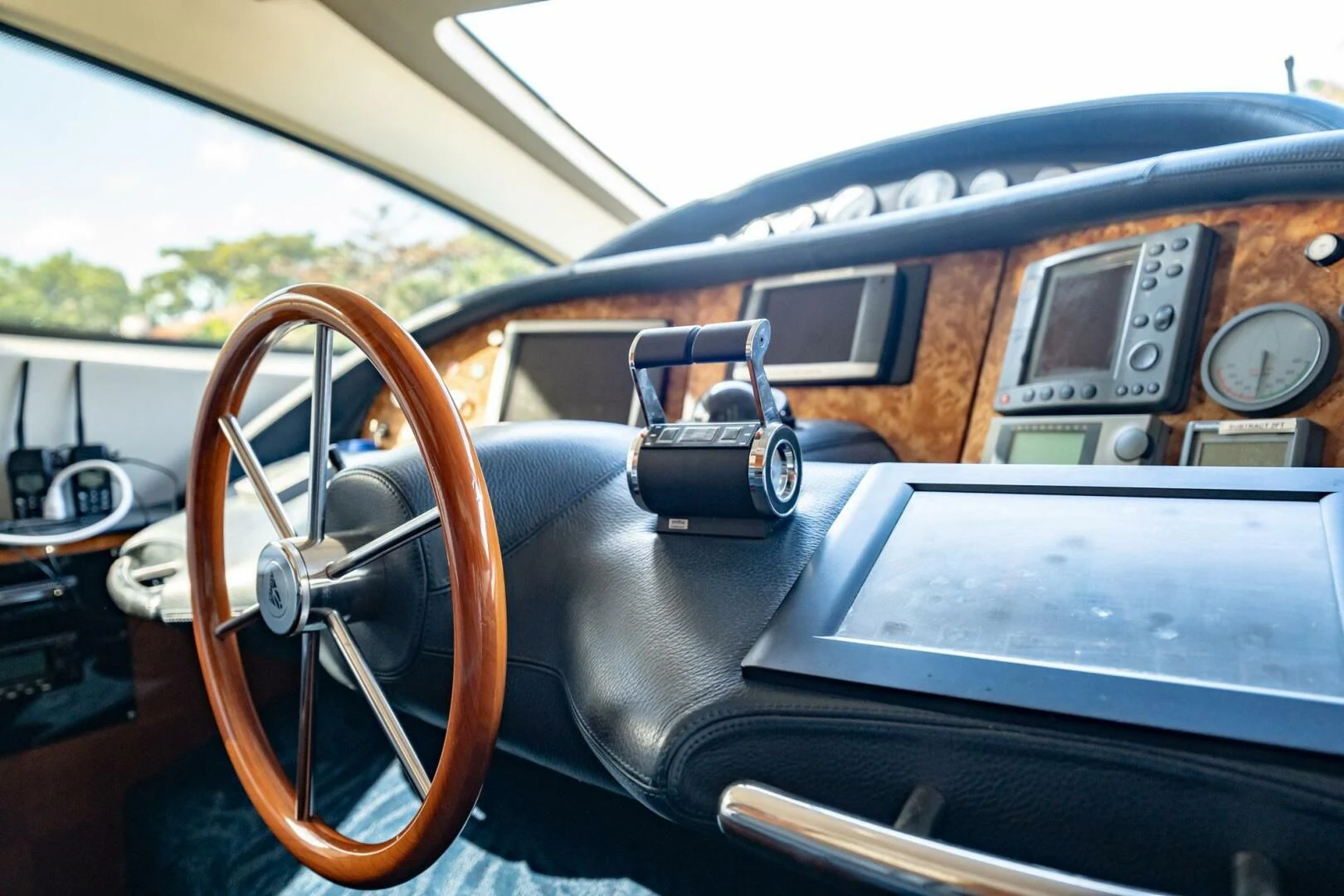 the interior of a car aboard THE CURE Yacht for Sale