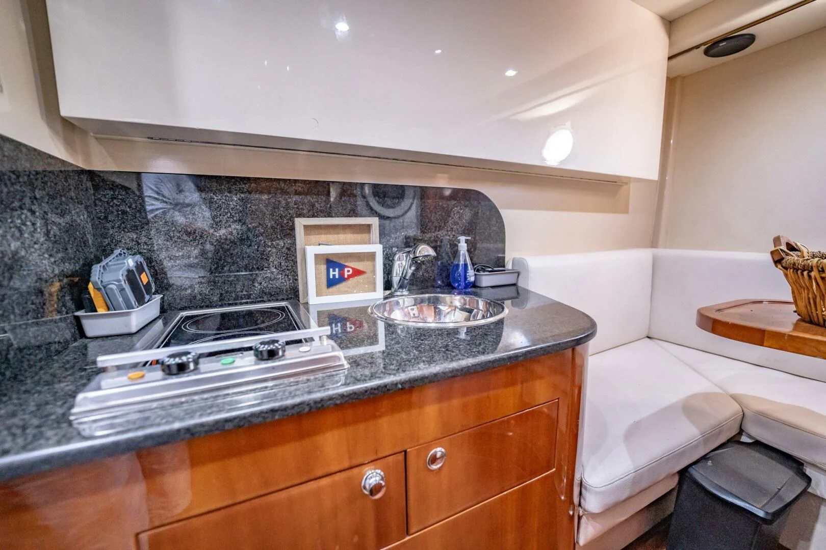 a kitchen with a sink and a stove aboard THE CURE Yacht for Sale