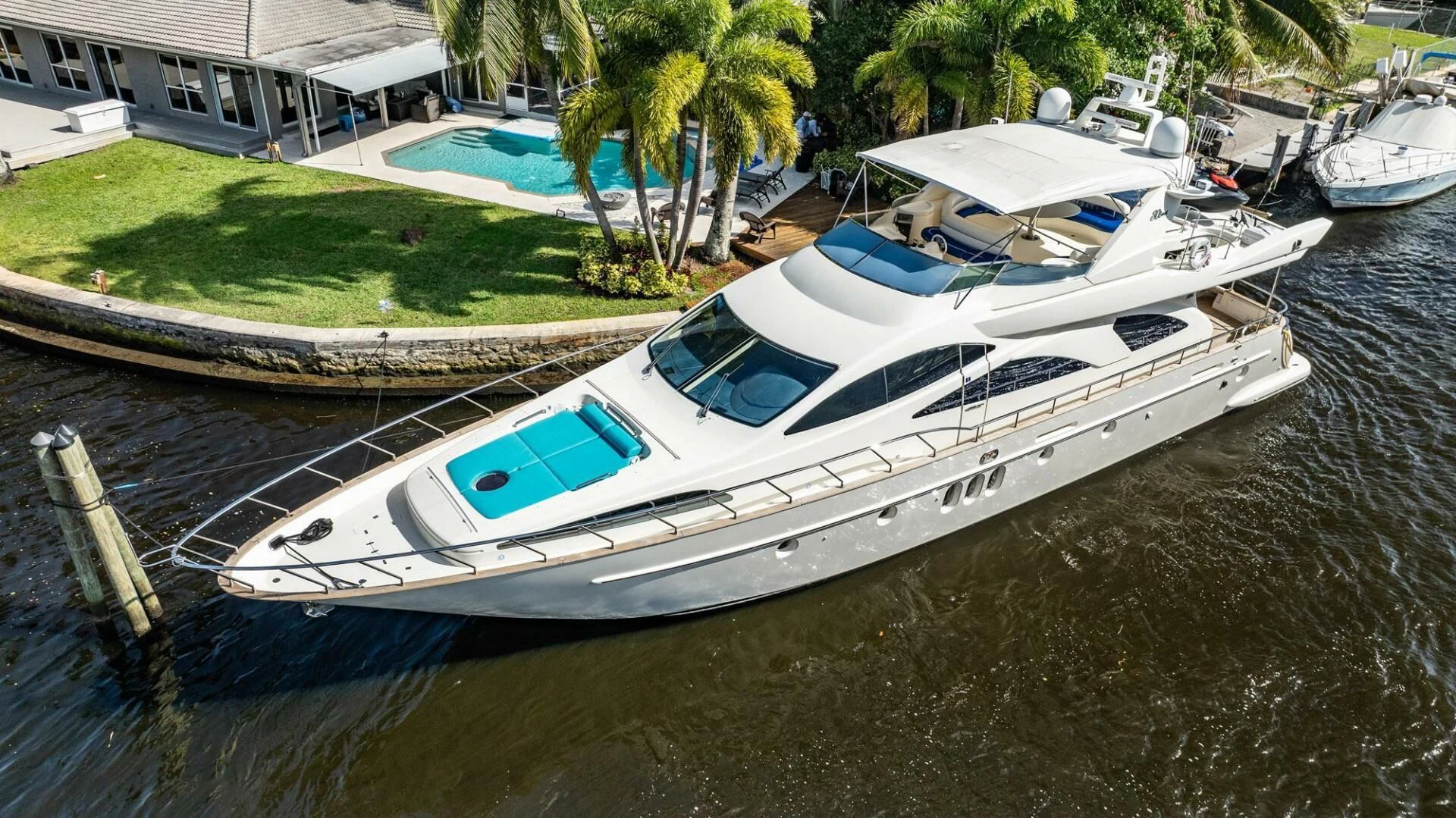 a boat tied to a dock aboard THE CURE Yacht for Sale