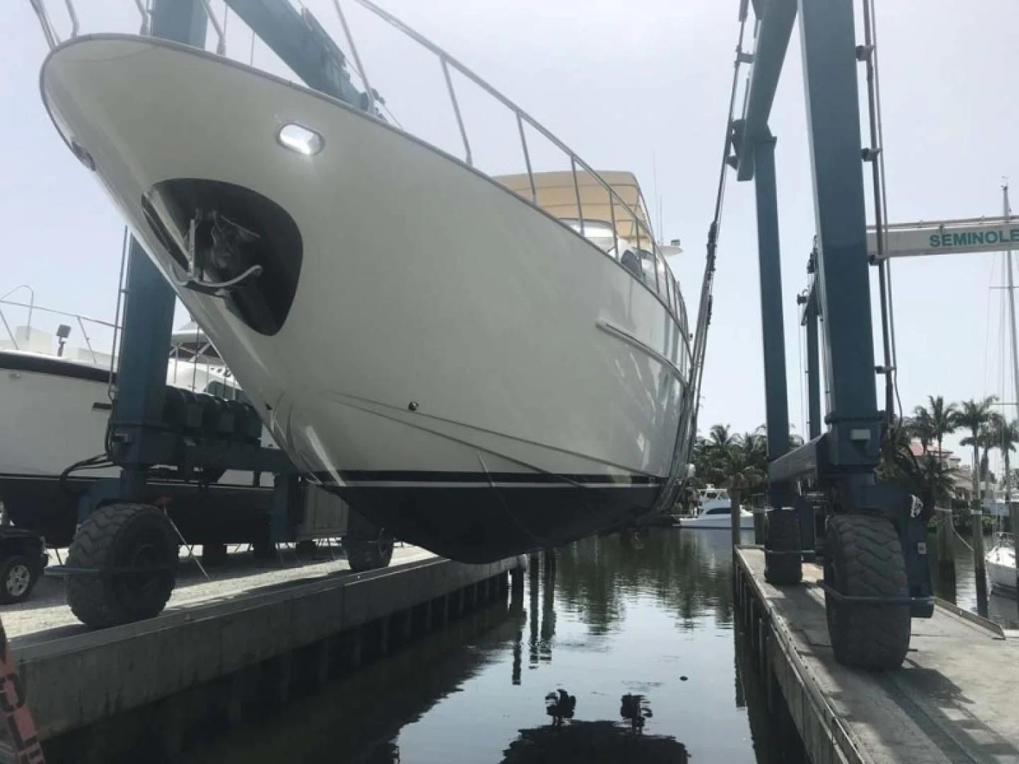 a boat docked at a pier aboard THE CURE Yacht for Sale