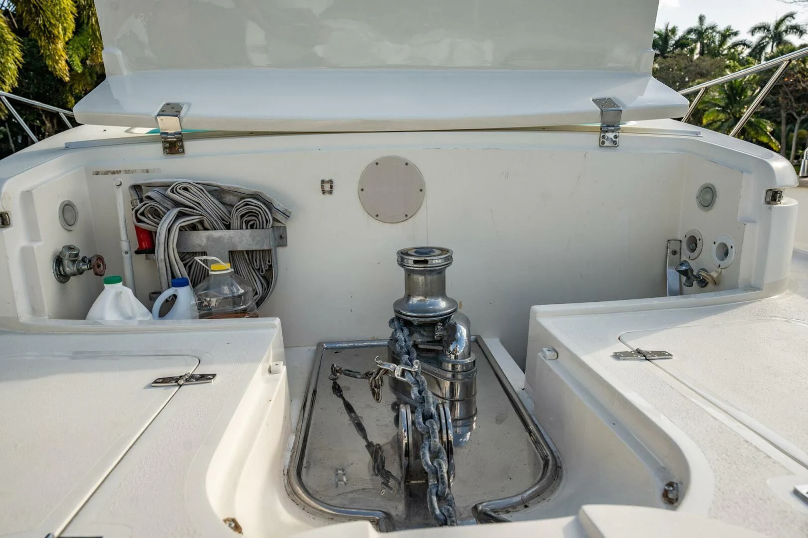 a white machine with a metal cylinder aboard THE CURE Yacht for Sale