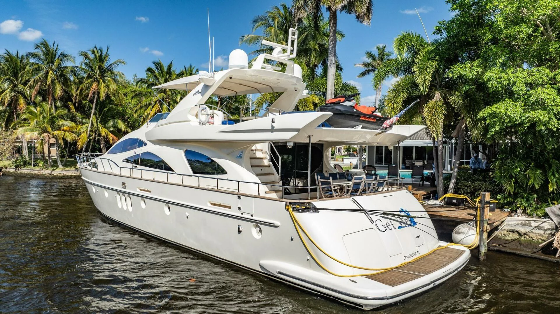a boat docked at a pier aboard THE CURE Yacht for Sale