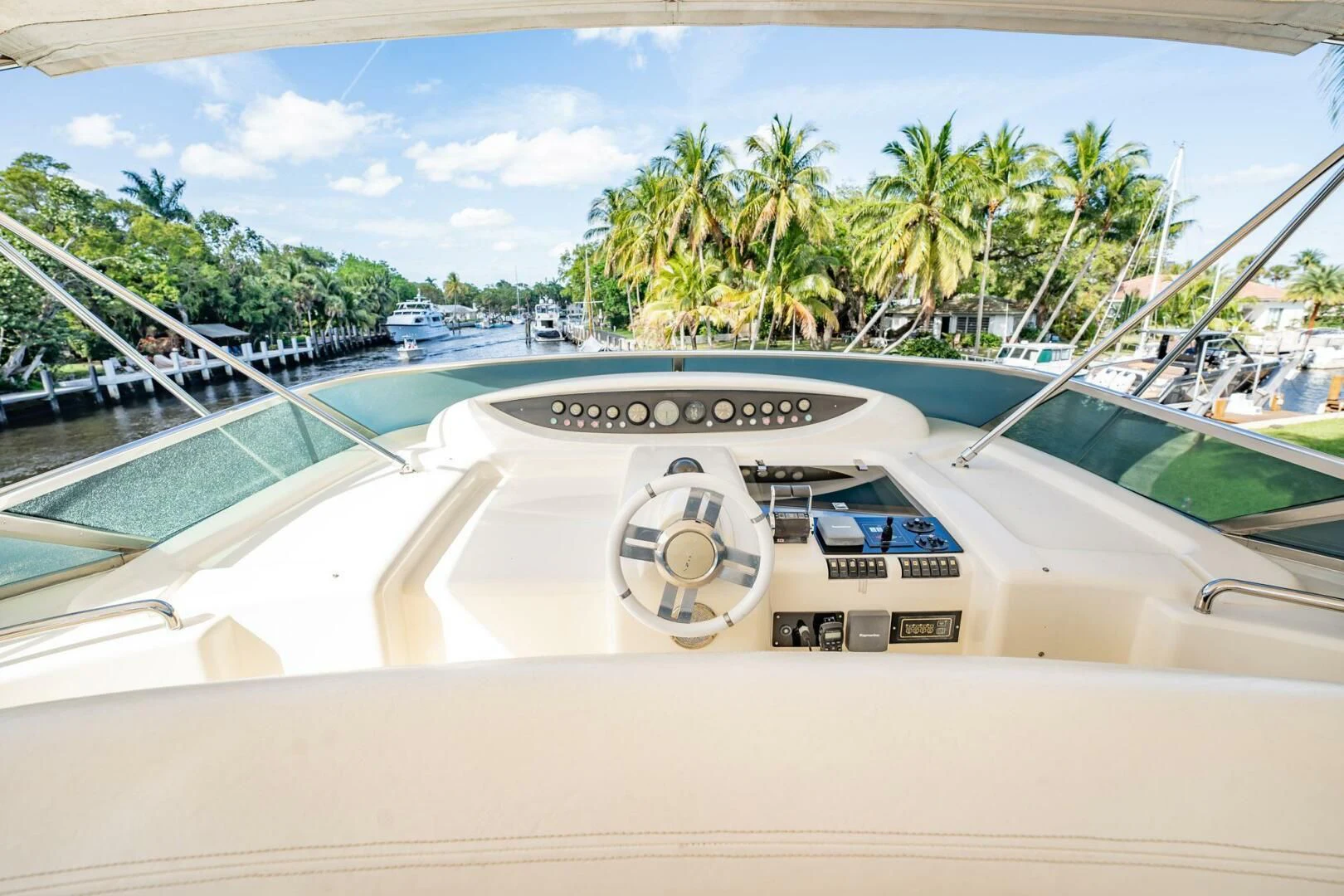a white car parked on a dock aboard THE CURE Yacht for Sale
