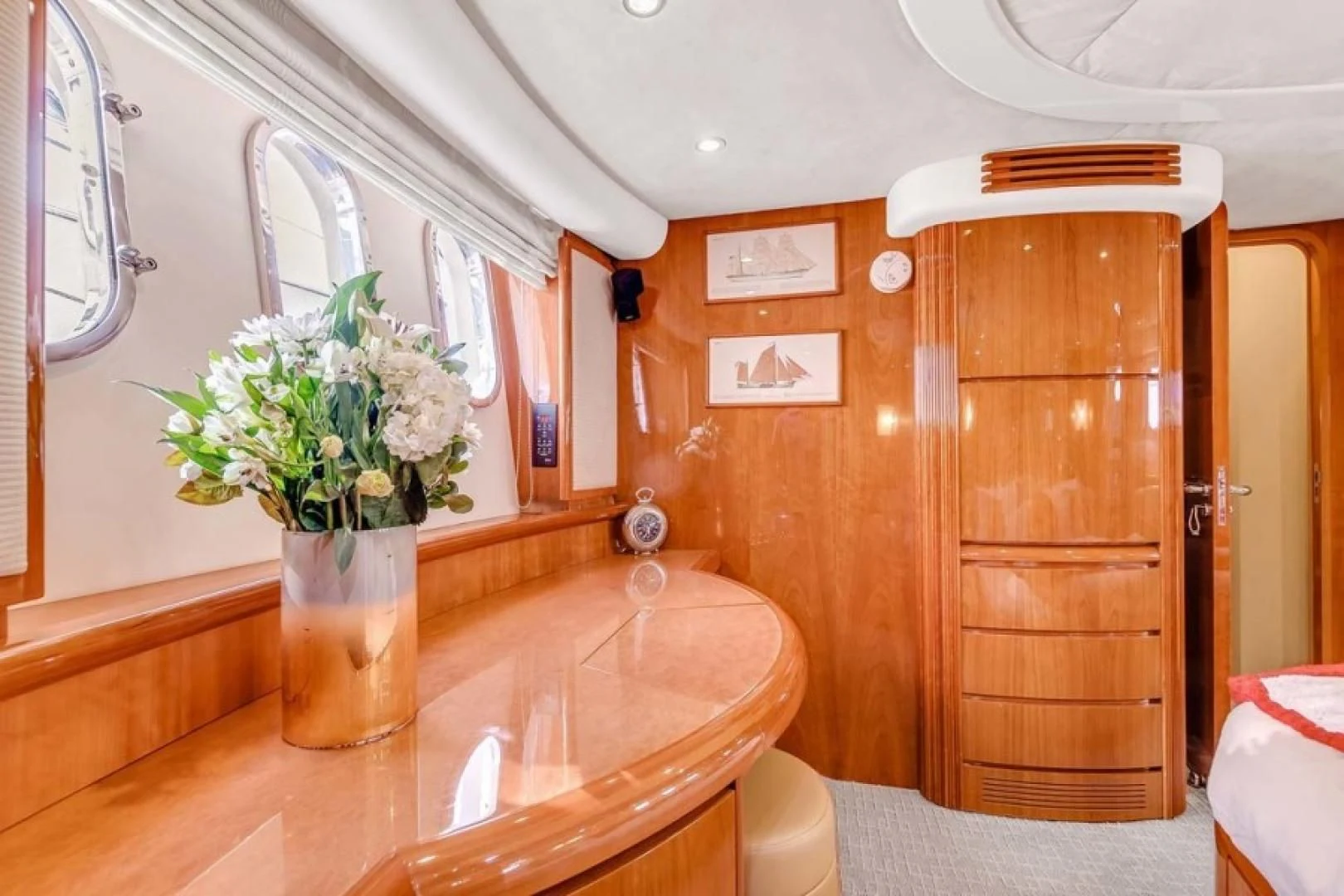 a bathroom with a sink and a mirror aboard THE CURE Yacht for Sale