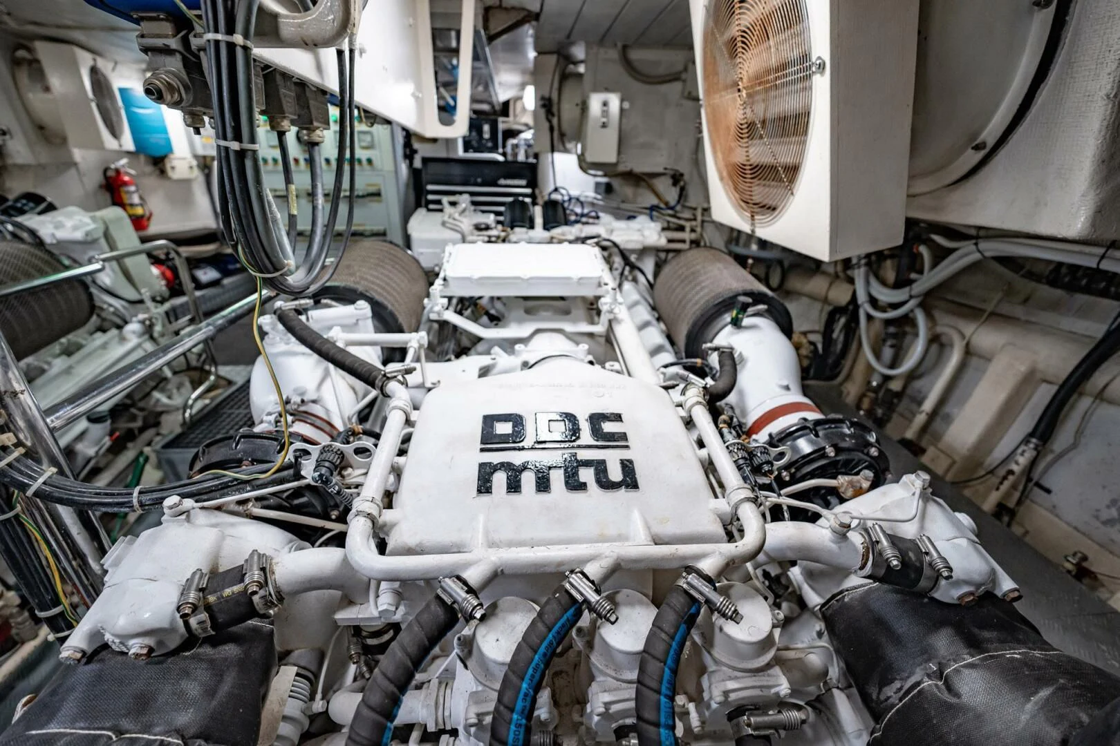 a close-up of a car engine aboard THE CURE Yacht for Sale