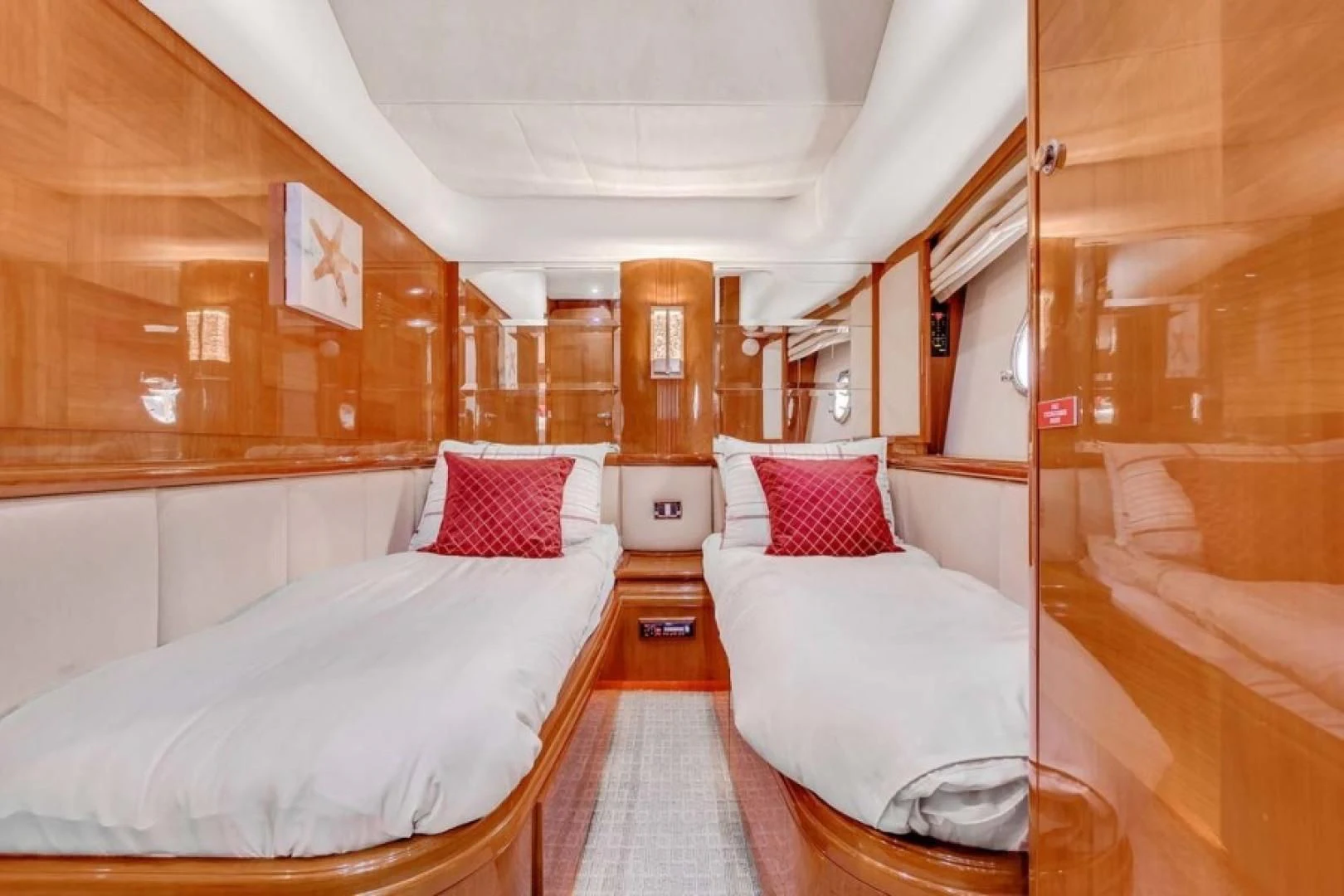 a room with two beds aboard THE CURE Yacht for Sale