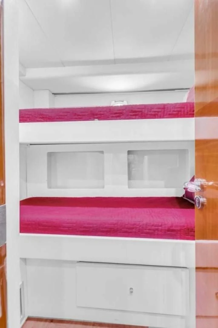 a white cabinet with drawers aboard THE CURE Yacht for Sale