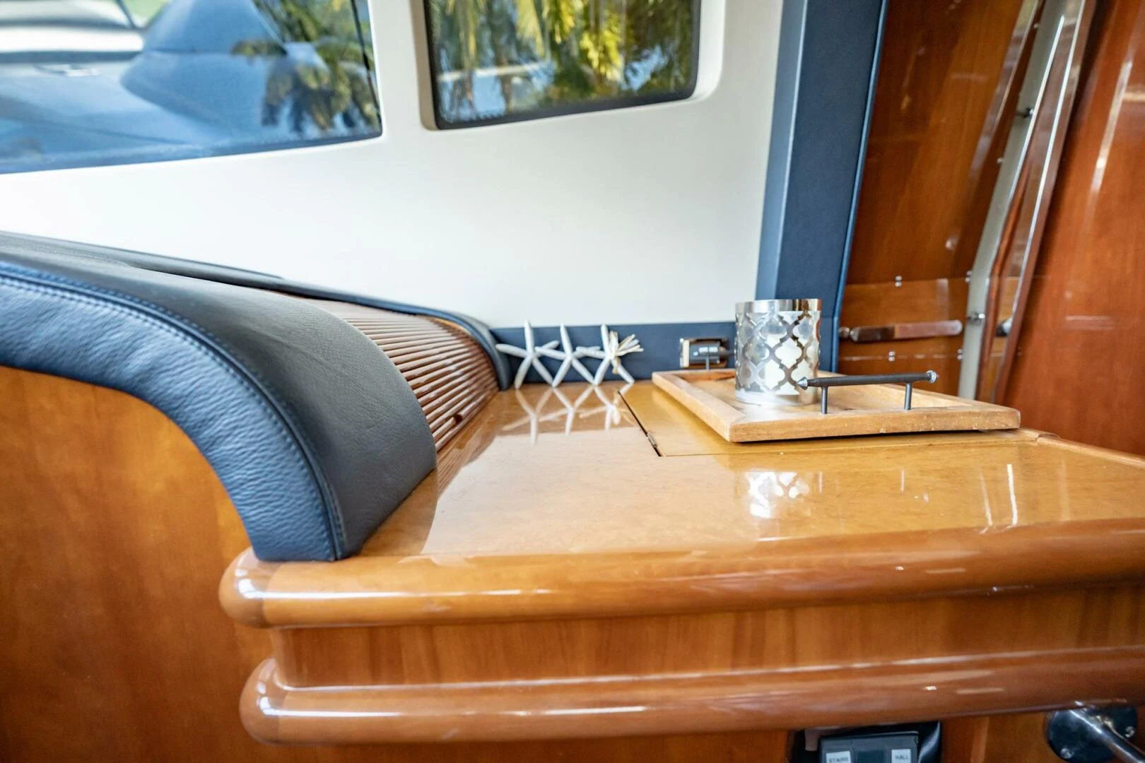 a coffee cup on a table aboard THE CURE Yacht for Sale