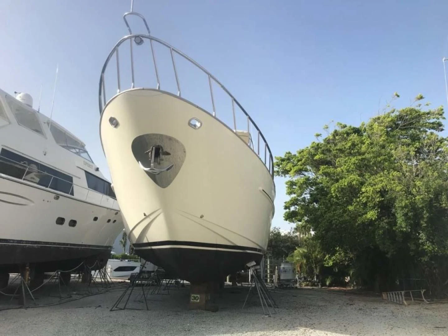 a large metal object next to a boat aboard THE CURE Yacht for Sale