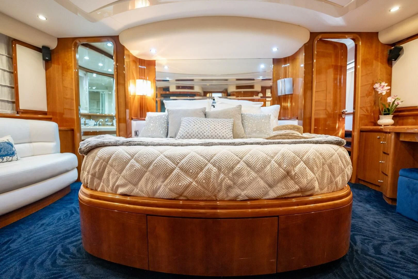 a large bed in a room aboard THE CURE Yacht for Sale