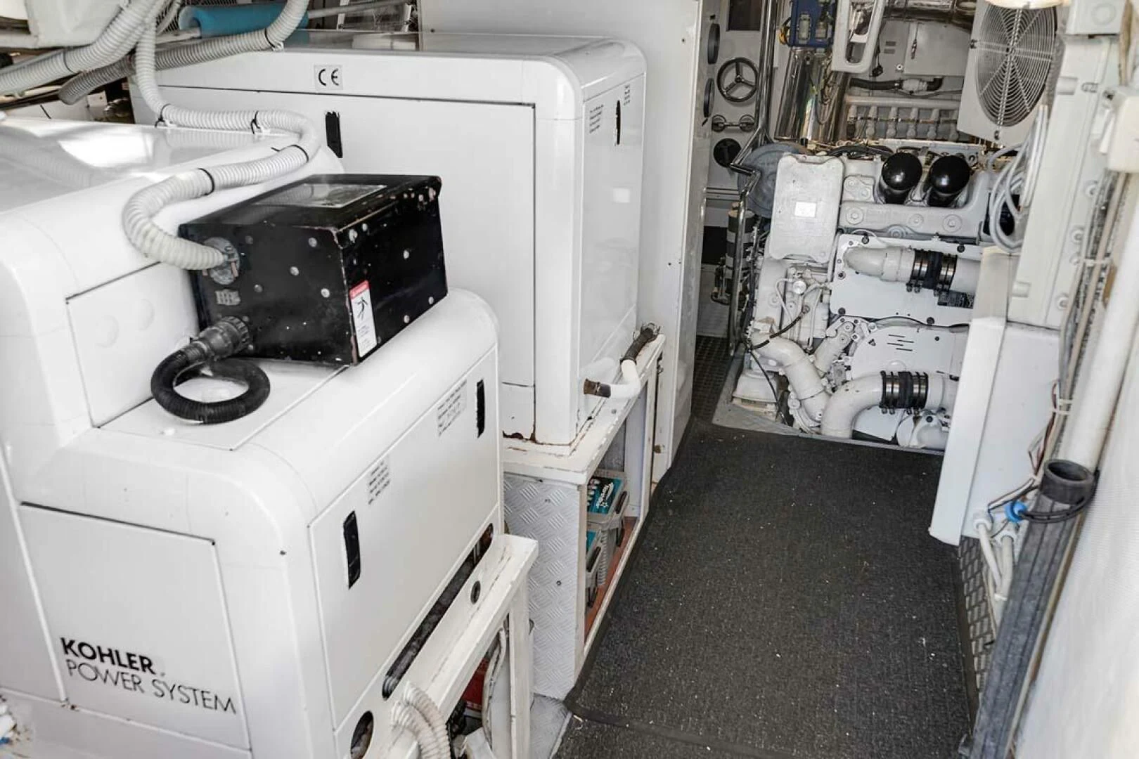 a machine in a room aboard THE CURE Yacht for Sale
