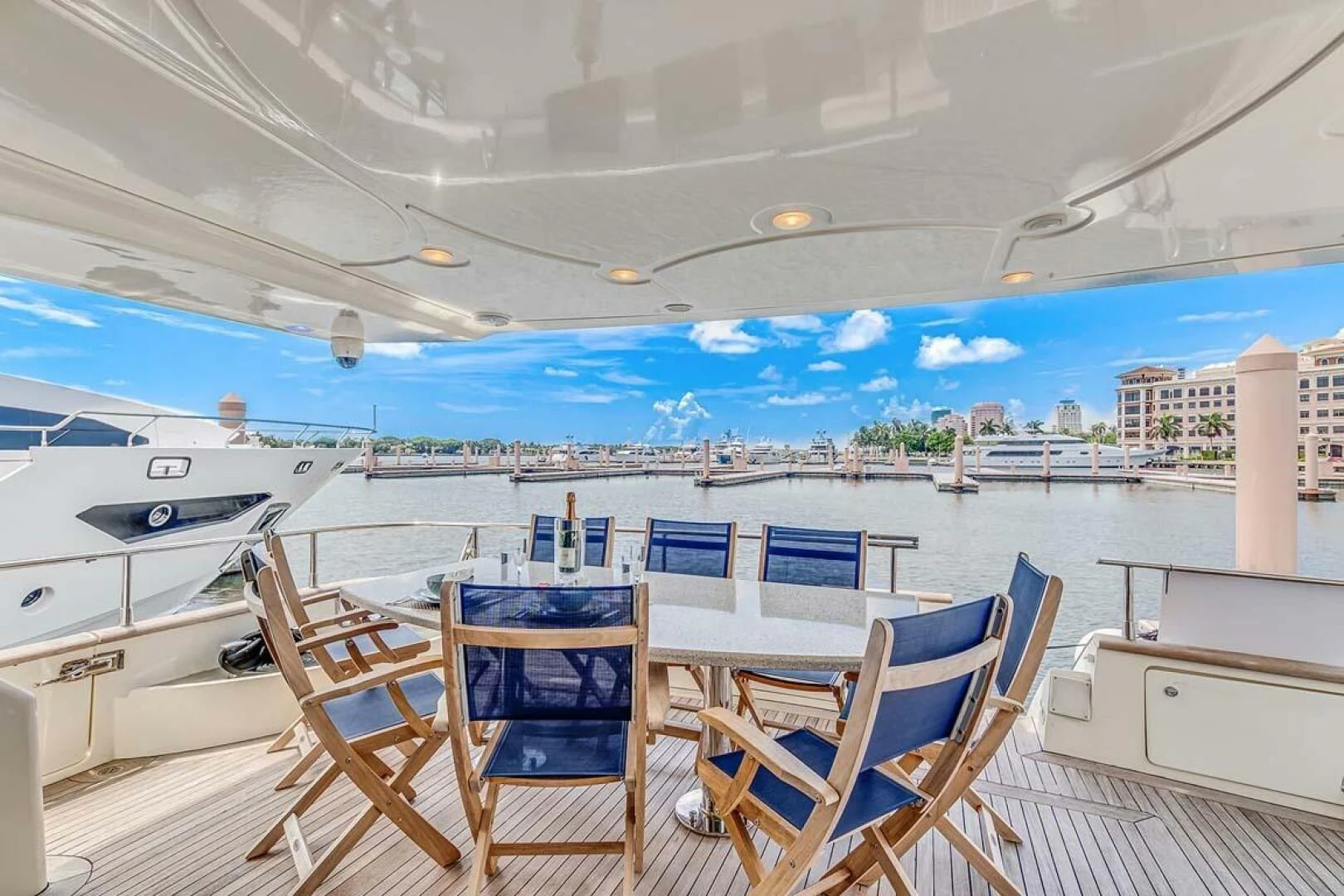 a deck with chairs and a pool aboard THE CURE Yacht for Sale